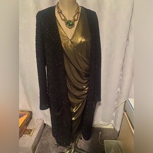 Final Act. Class act. Metallic duster 🖤unique glamour at best.💄